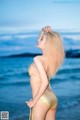 Atittaya Chaiyasing beauty poses hot on the beach with a yellow bikini (41 photos) P7 No.af984e